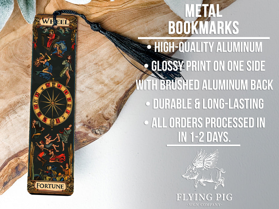 a metal bookmark with an image of a clock on it