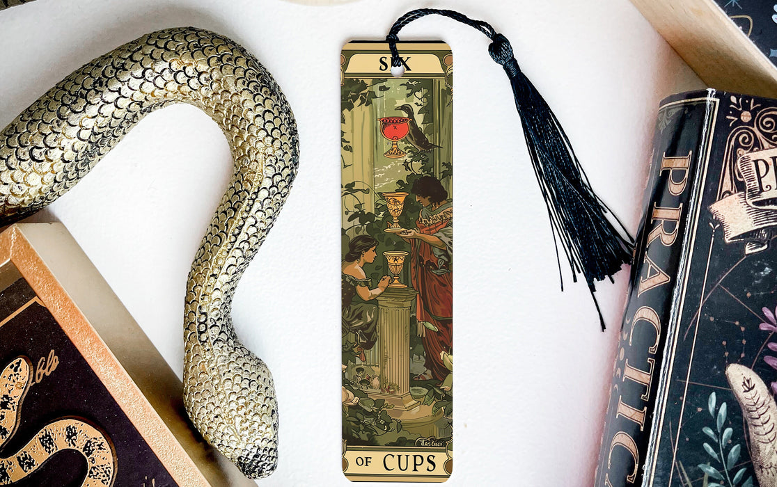 a bookmark with a snake and a snake on it