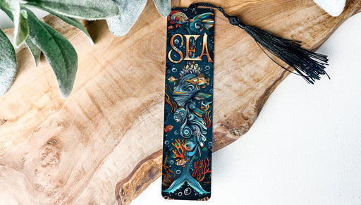 a bookmark with a picture of a mermaid on it