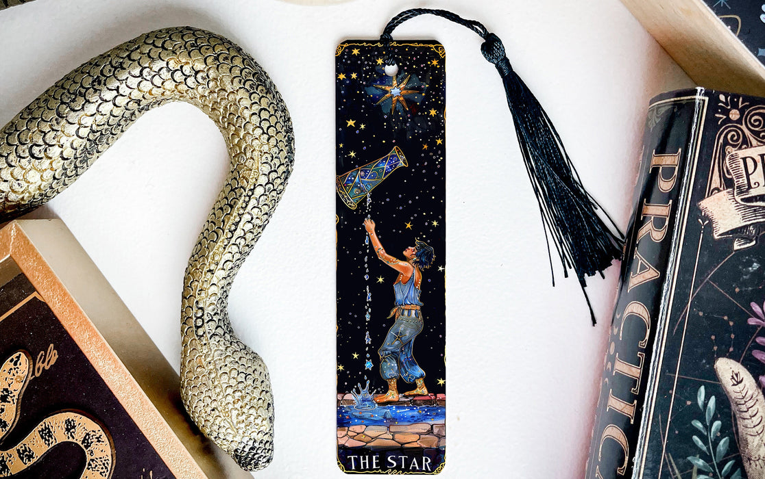 a bookmark with a picture of a man holding a star