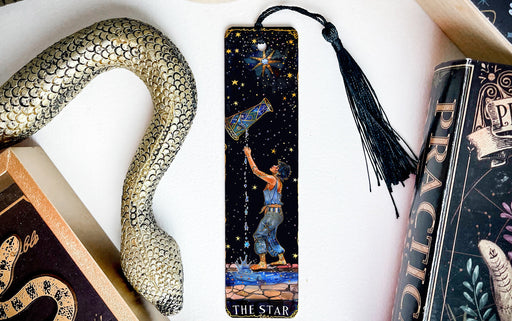 a bookmark with a picture of a man holding a star