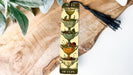 a bookmark with a tassel on top of it