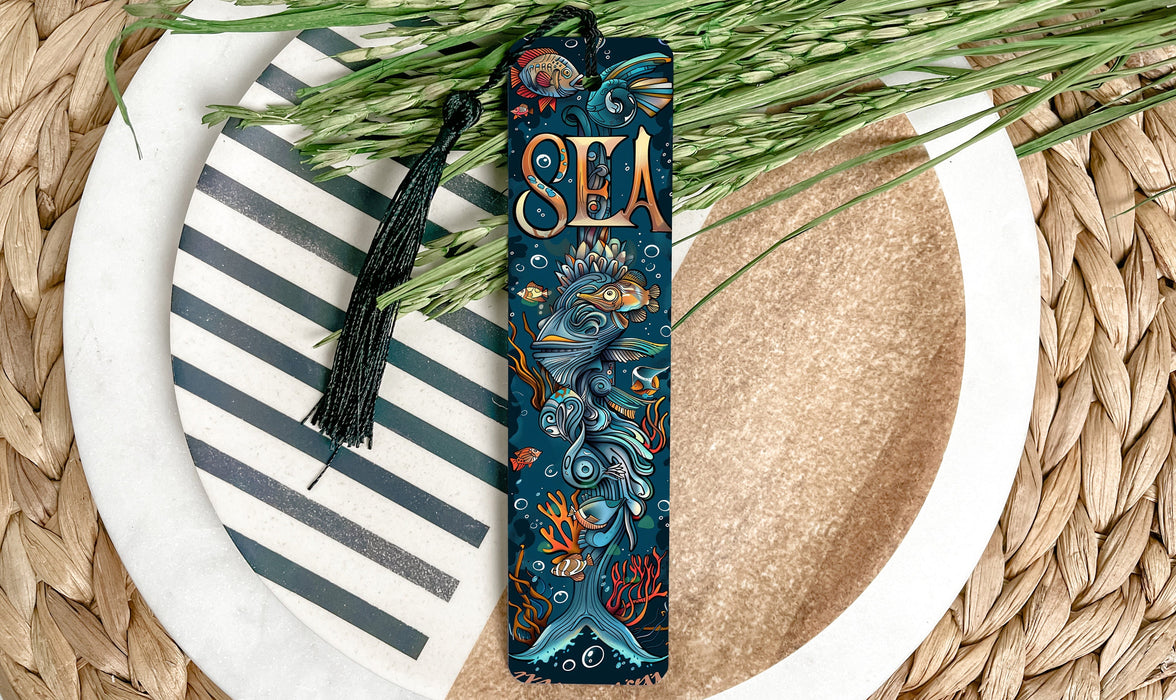 a blue bookmark with a sea theme on it