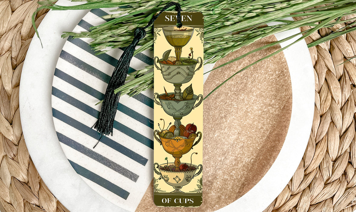 a table setting with a plate and a tall bookmark