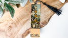 a bookmark with a picture of cups on it