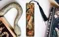 a bookmark with an image of a woman holding a snake