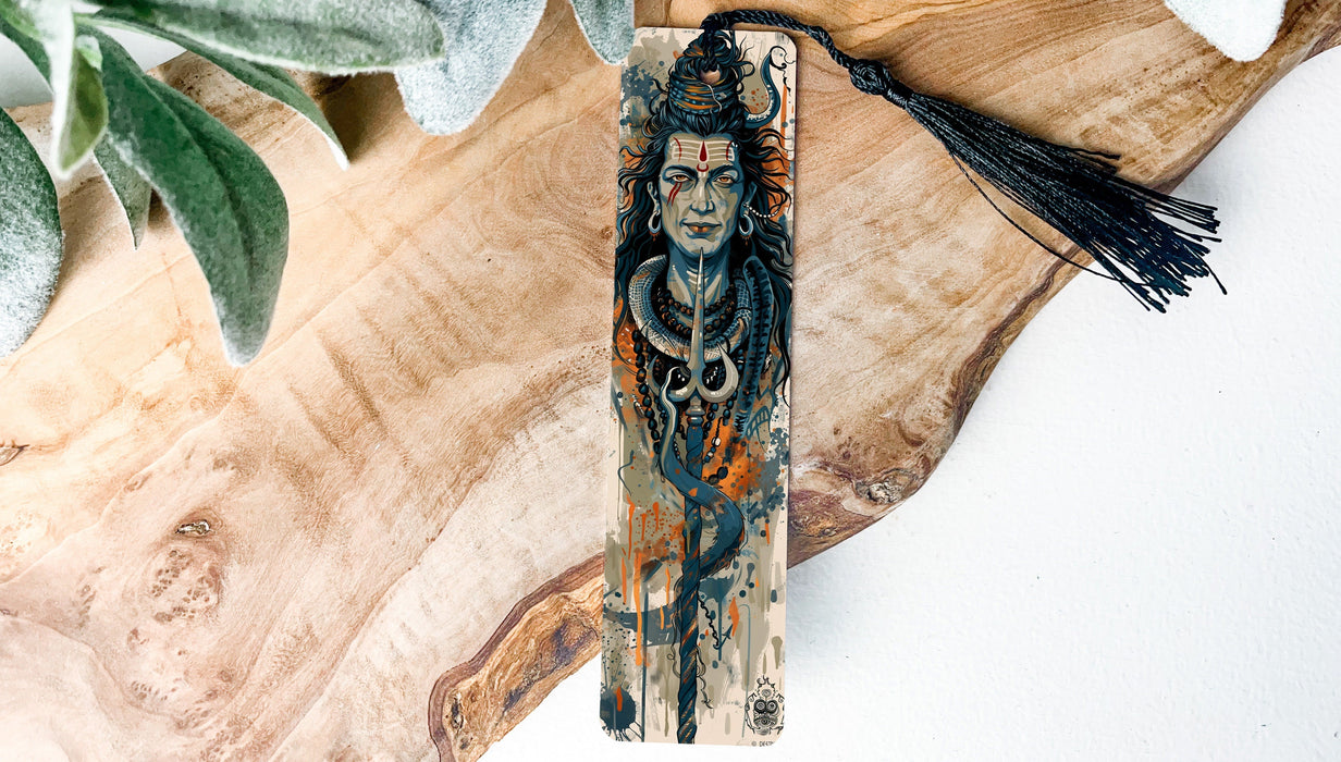 a wooden carving of a man with a hat and tassel