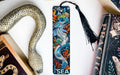 a bookmark with a dragon design on it
