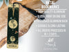 a metal bookmark with a tassel on top of it