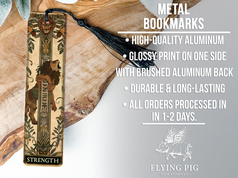 a metal bookmark with a lion on it
