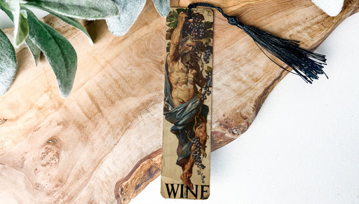 a wooden cross with a tassel hanging from it