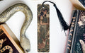 a bookmark with a picture of a woman and a snake on it