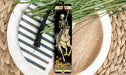 a bookmark with a skeleton riding a horse