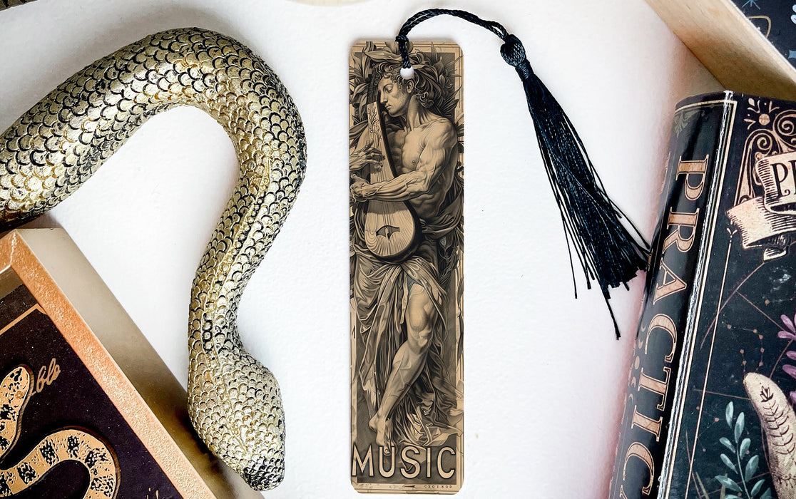 a bookmark with a snake and a snake on it