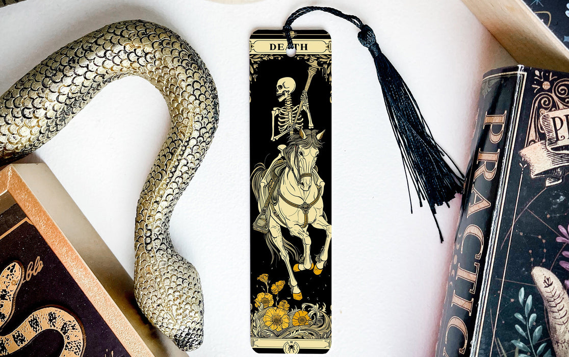 a bookmark with a skeleton riding a horse