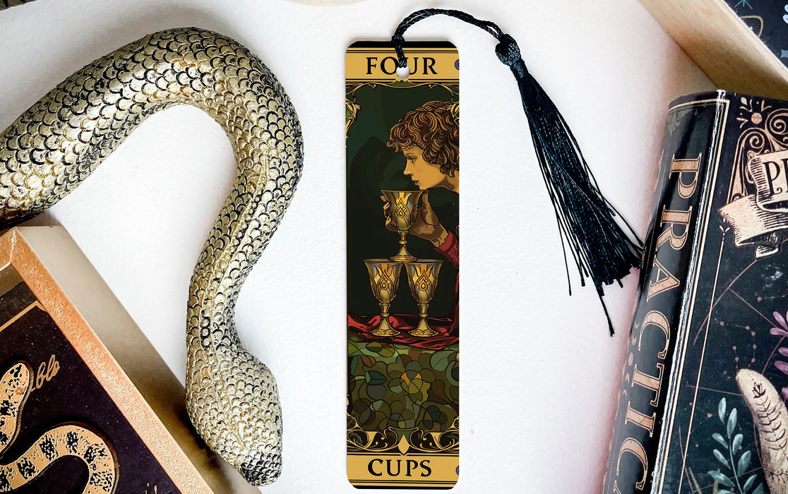 a bookmark with an image of a woman and a snake on it