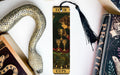 a bookmark with an image of a woman and a snake on it