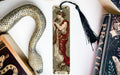 a bookmark with a picture of a woman holding a snake