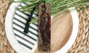 a bookmark with a picture of a roman soldier on it