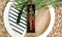 a bookmark with a picture of a skeleton on it