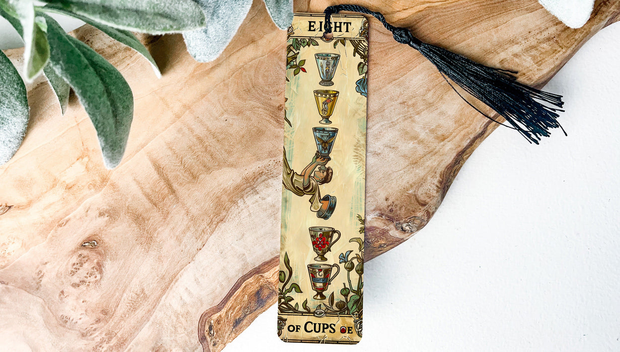 a bookmark with a tassel hanging from it