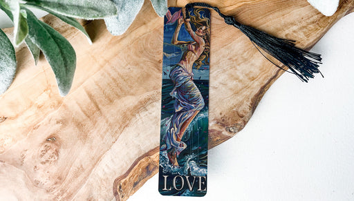 a bookmark with a picture of a mermaid on it