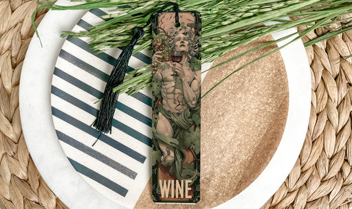 a bottle of wine sitting on top of a plate