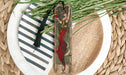 a picture of a woman in a red dress on a plate