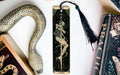 a bookmark with a snake and a snake on it