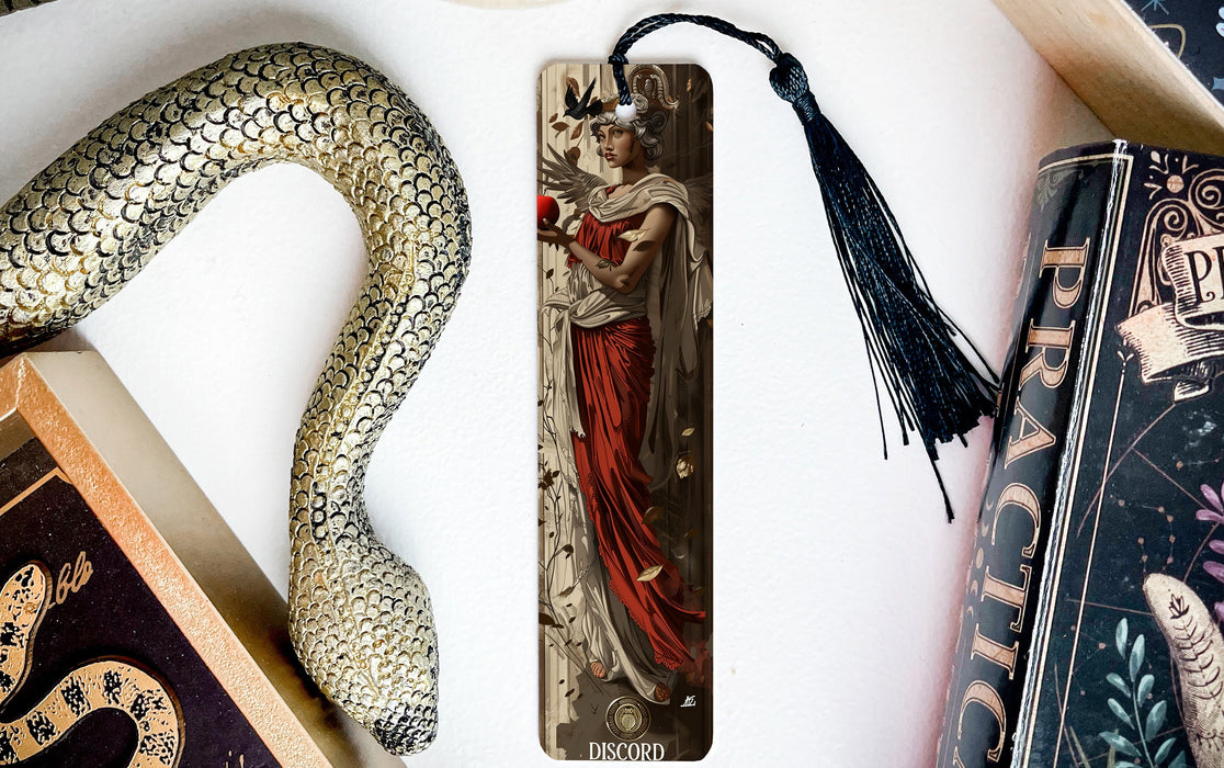 a bookmark with a picture of a woman and a snake on it