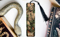 a bookmark with a picture of a woman and a snake on it