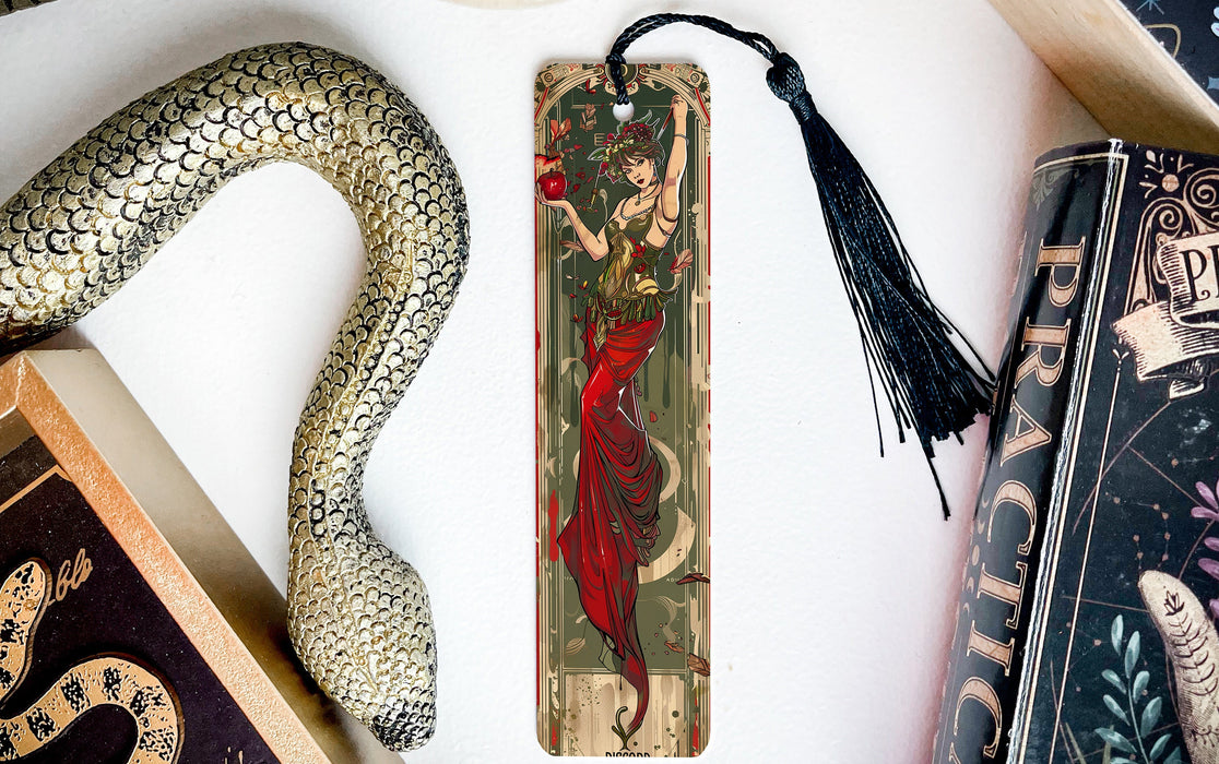 a bookmark with a snake and a woman on it