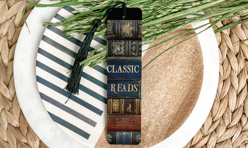 a stack of books sitting on top of a white plate