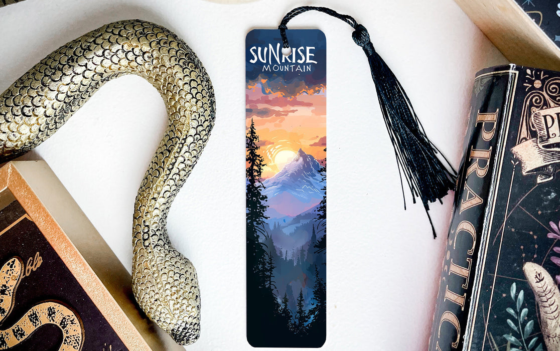 a bookmark with a picture of a mountain scene