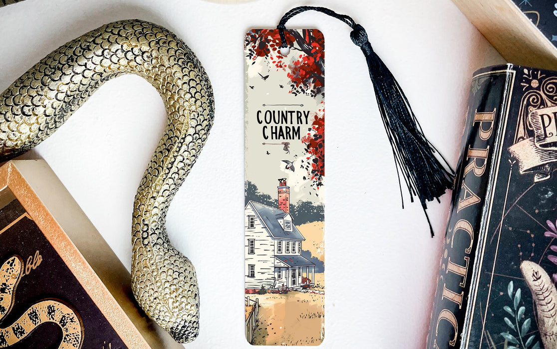 a snake, a bookmark, and a book on a table