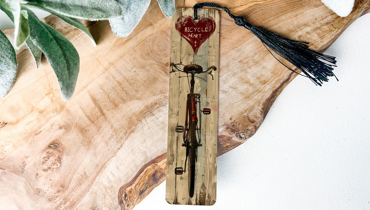 a wooden clock with a red heart on it