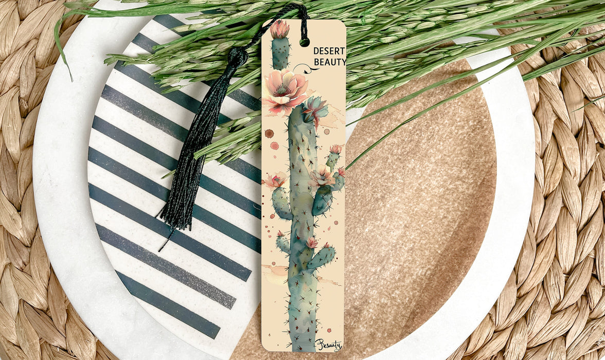 a bookmark on a plate next to a plant