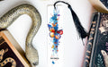 a bookmark with a picture of a butterfly on it