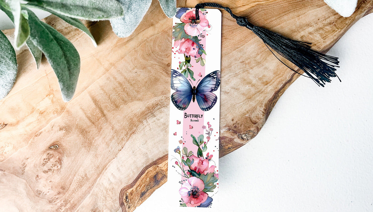 a bookmark with a butterfly and flowers on it