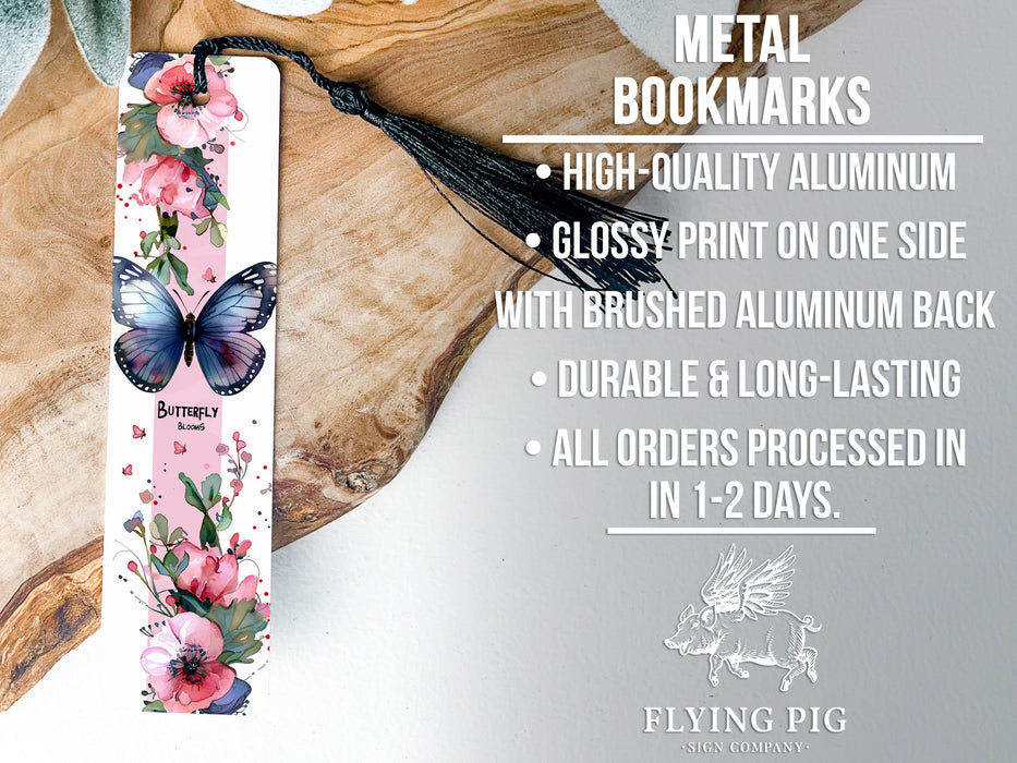a close up of a bookmark with a butterfly on it