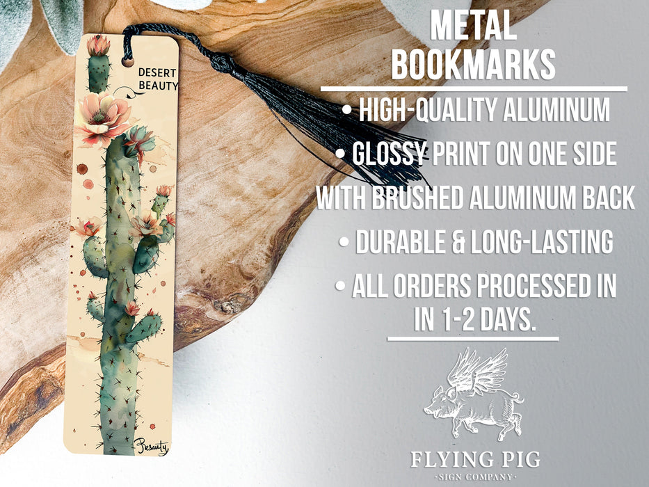 a metal bookmark with a cactus on it
