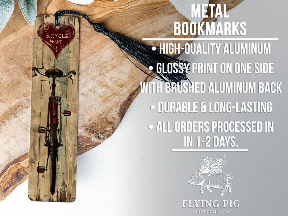 a metal bookmark with a heart on it