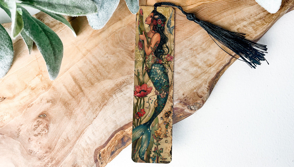 a bookmark with a picture of a mermaid on it