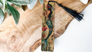 a bookmark with a picture of a mermaid on it
