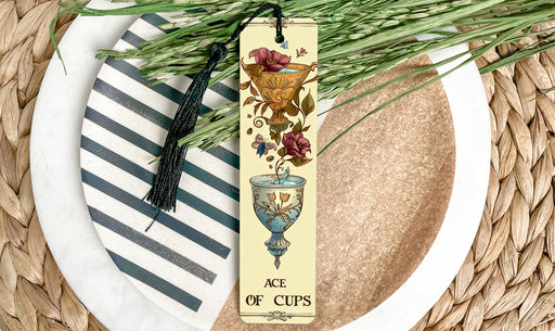 a bookmark with a picture of a vase of flowers on it