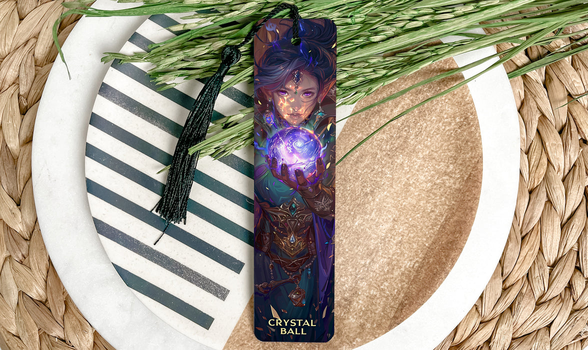 a bookmark with a picture of a woman holding a crystal ball