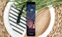 a bookmark with a picture of a telescope on it