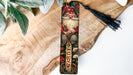 a bookmark with a picture of a gnome on it