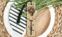 a bookmark with a bicycle and flowers on it