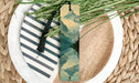 a close up of a plate with a bookmark